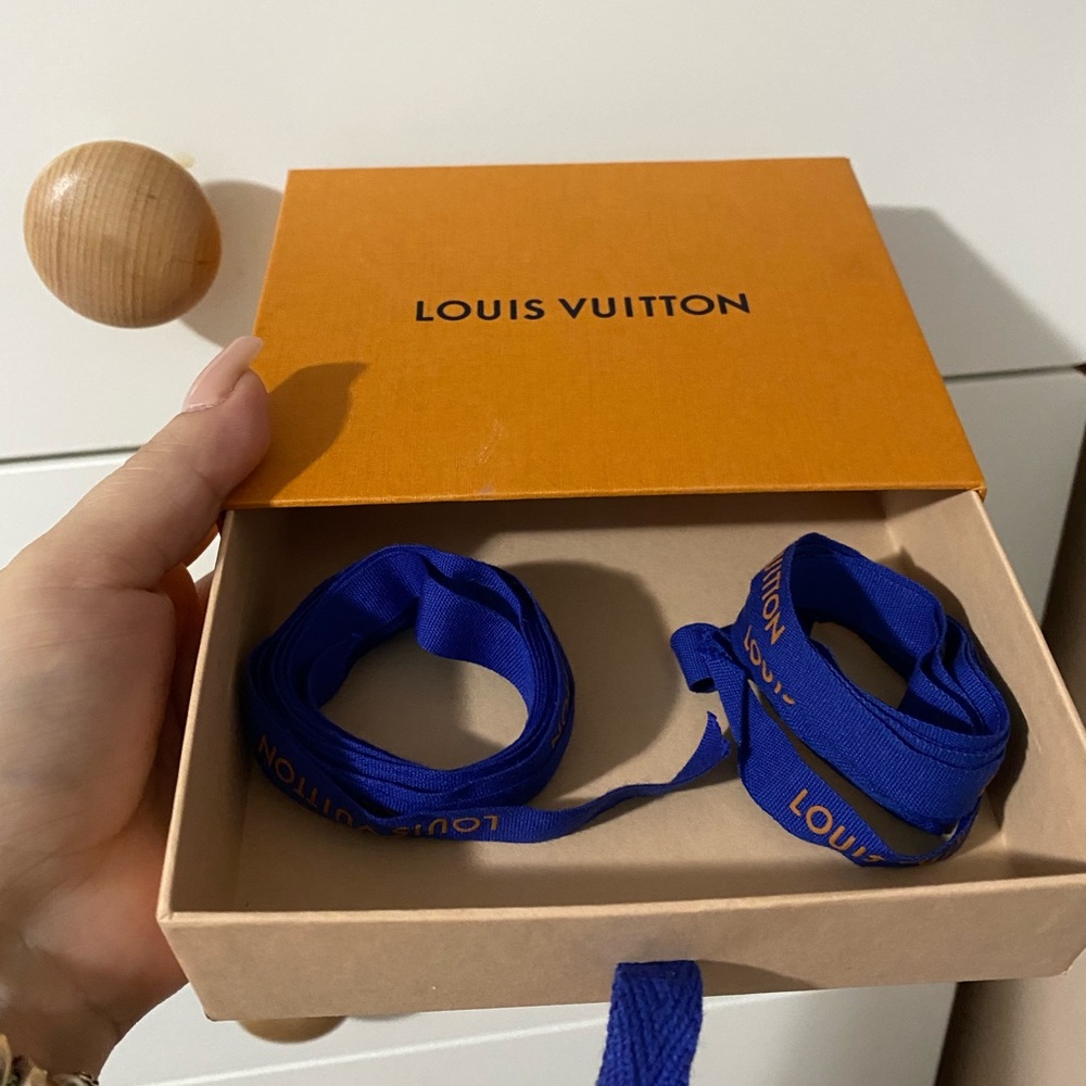 Louis Vuitton box and ribbons